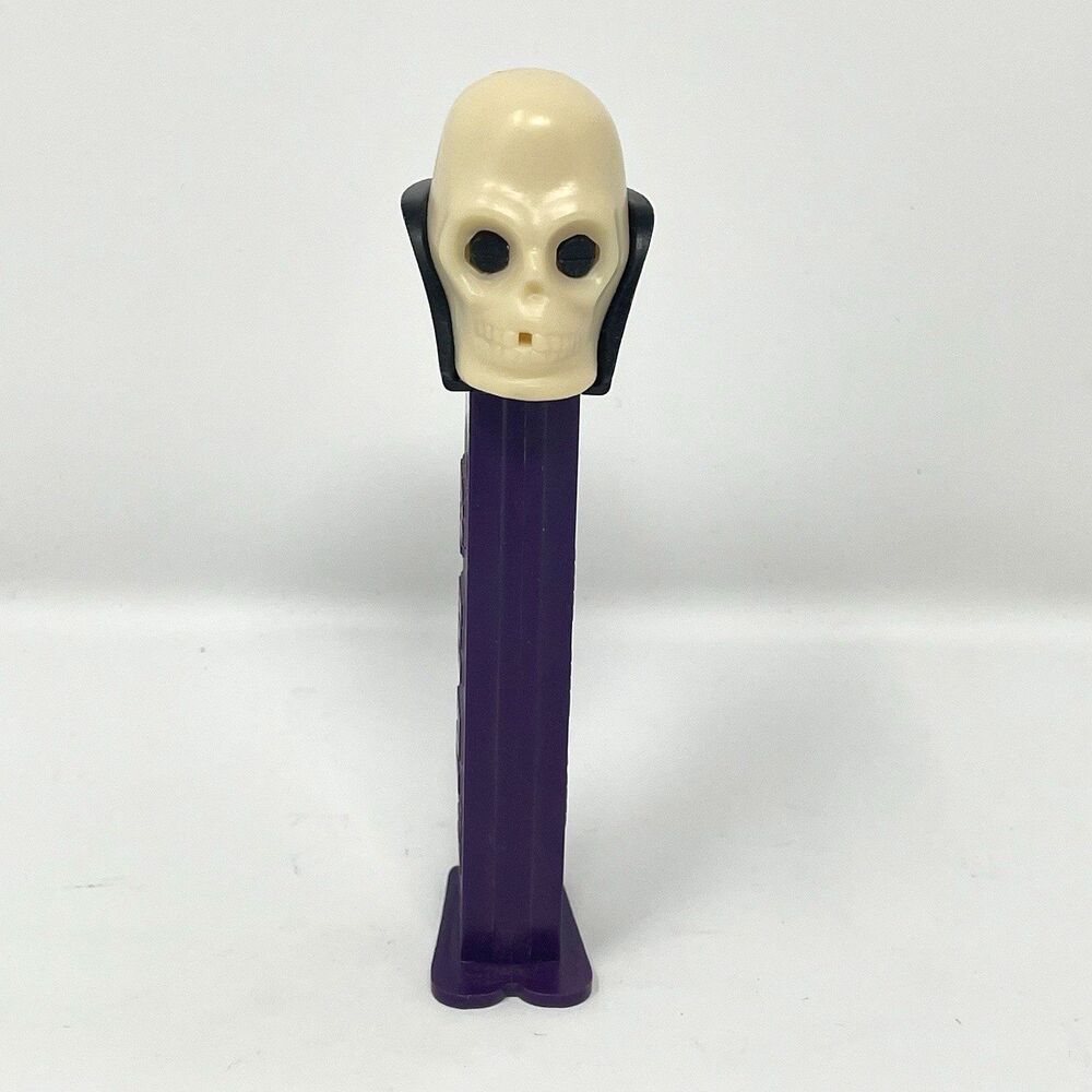 Vintage Dr. Skull Pez Dispenser Purple Stem Made in Slovenia with Feet Halloween